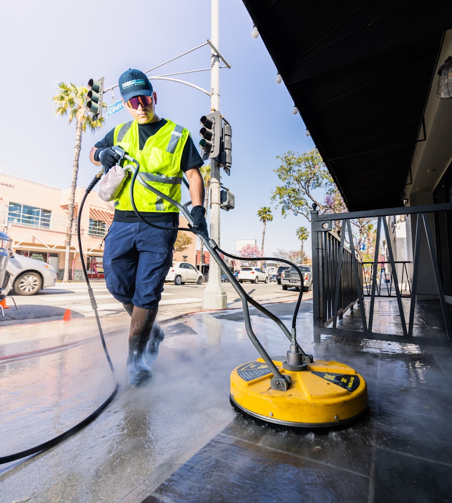 Surface cleaner in action on concrete