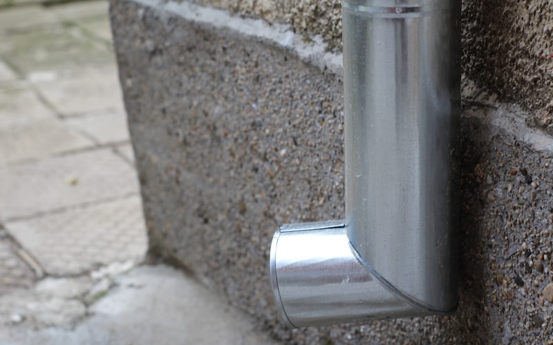 A downspout and gutter on a home